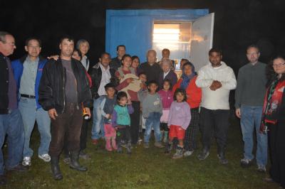 Gathering with Roma to worship in their "church building" - a shipping container. Dicanesti, Romania.