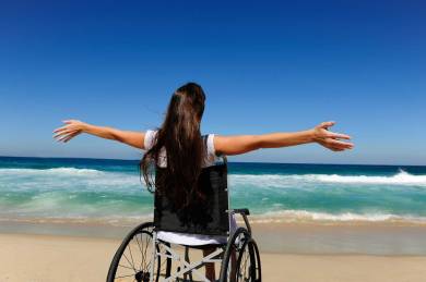 disabled-woman-in-wheelchair-at-heaven-beach